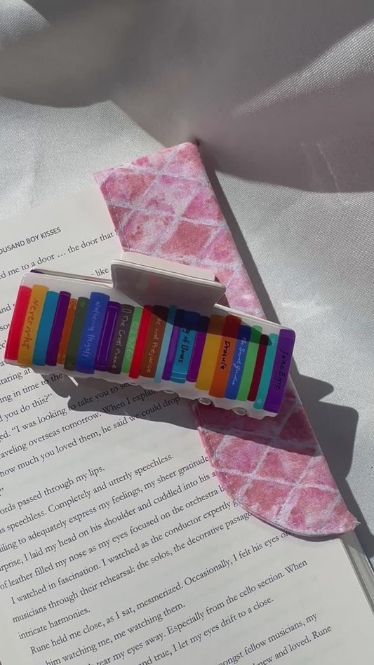 Hair claws -Stack of books